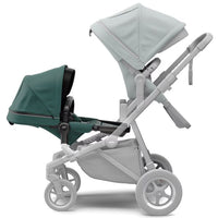 Thule Sleek Geschwisterwagen mit Babywanne und Zweitsitz in Soft Green